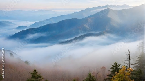 Beautiful landscape with fog in the mountains at sunrise. Nature background