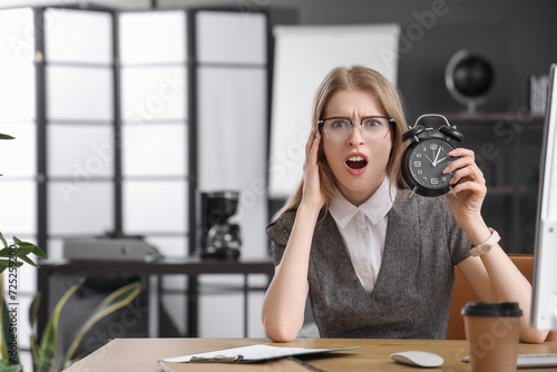 Shocked young businesswoman...