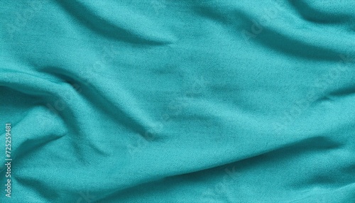 Cyan crumpled fabric texture background