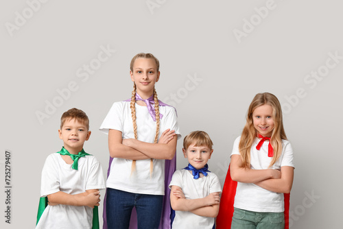 Cute kids dressed as superh...