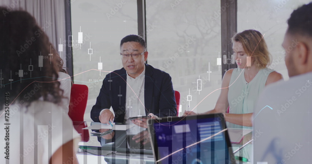 Image of interface showing statistics and information with business people talking at a meeting Image of interface showing statistics and information with business people talking at a meeting