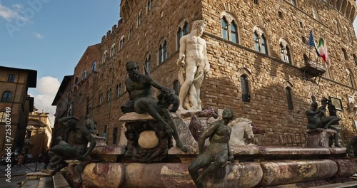 Fountain of Neptune in Florence, Italy. Cityscape with tattoos in the center of the historical city of Italy. High quality 4k footage photo