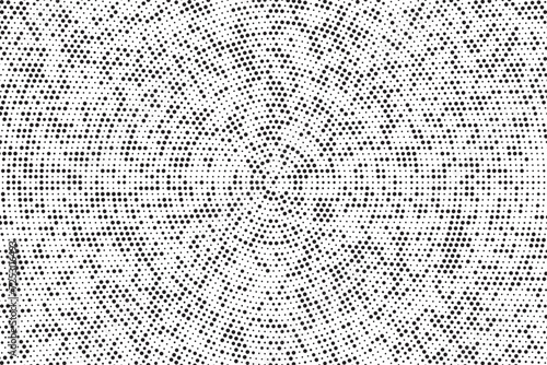 Abstract dotted pop art radial background. Abstract radial halftone texture. Monochrome background of black dots on white.