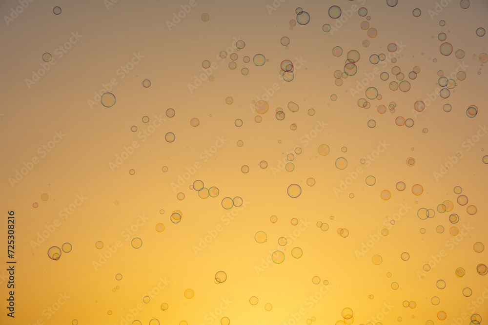 Lots of soap bubbles in the sky at sunset Lots of soap bubbles in the sky at sunset