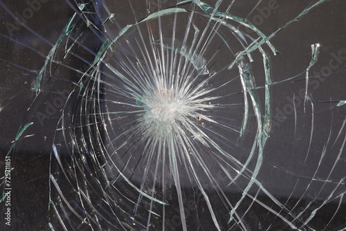 crashed glass impact , window shatterd by gunshot
