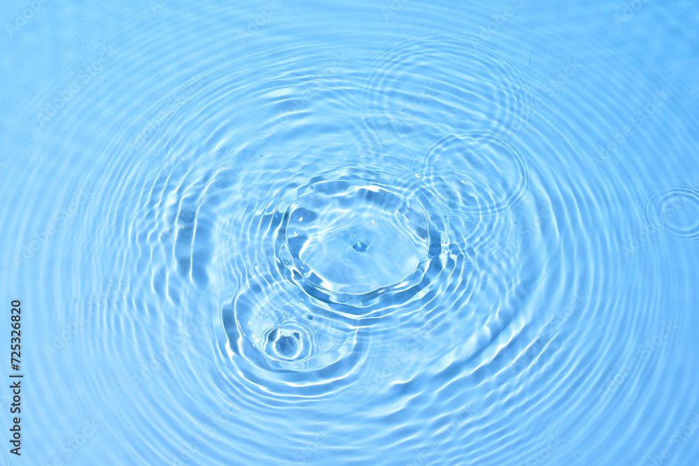 top view sky blue water rings, Close up water droplets, water surface top view sky blue water rings, Close up water droplets, water surface