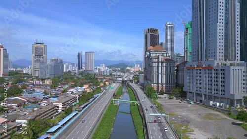 City Kuala Lumpur river street village. Breathtaking aerial view flight drone photo