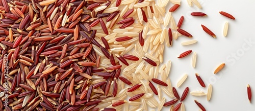 Close up of white background with isolated red and brown rice texture. photo