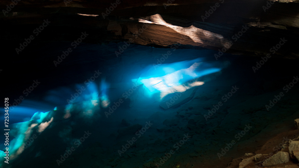 Mystical Sunlight Filtering Through an Underground Cave