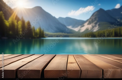 Empty wooden tabletop with blur background of summer lakes mountain. Perspective wood display on lake view. Beautiful rock glacier fresh landscape scenery  plank table blank board for product montage