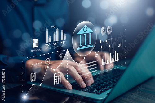 Businessman using the laptop with  bank and tax icons,Concept of tax payment optimisation business finance