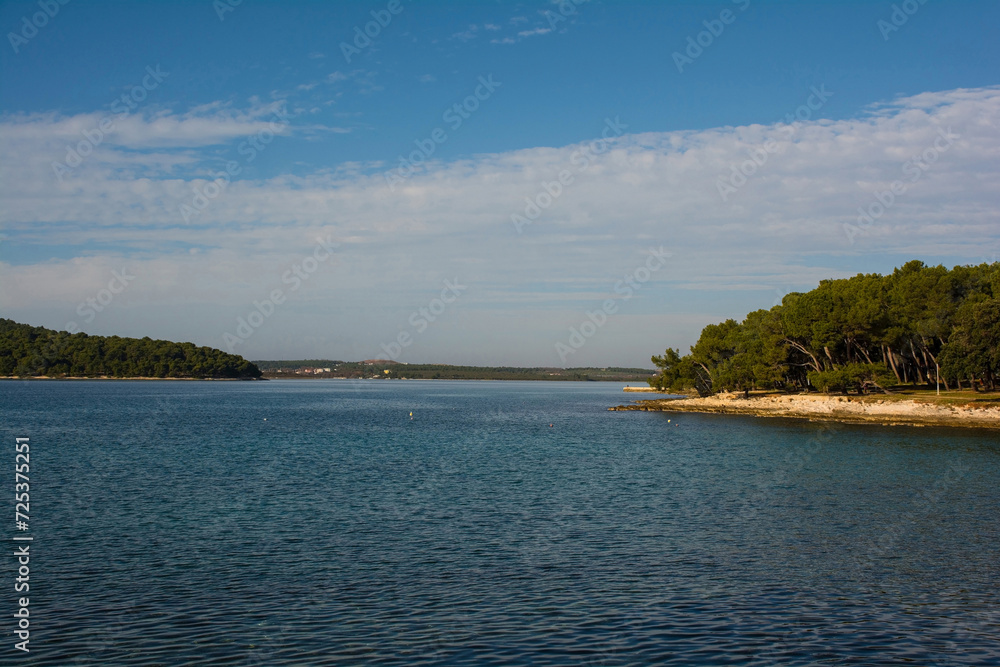 The coast of the Kasteja Forest Park - Park Suma Kasteja - in Medulin, Istria, Croatia. Premantura peninsula is on the left. December