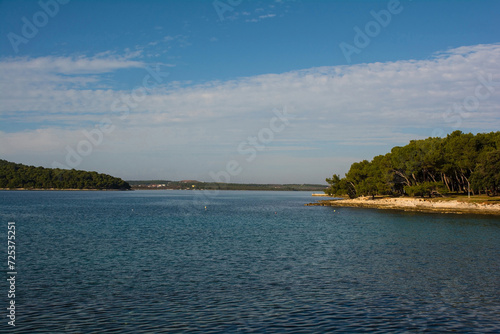 The coast of the Kasteja Forest Park - Park Suma Kasteja - in Medulin, Istria, Croatia. Premantura peninsula is on the left. December