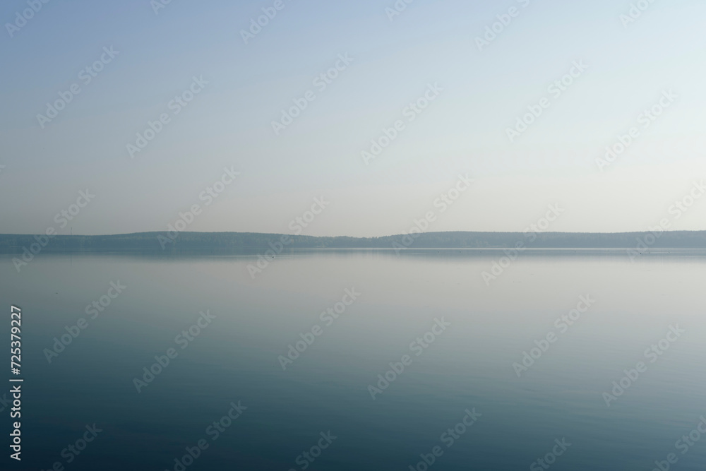 morning fog over the lake, horizon line