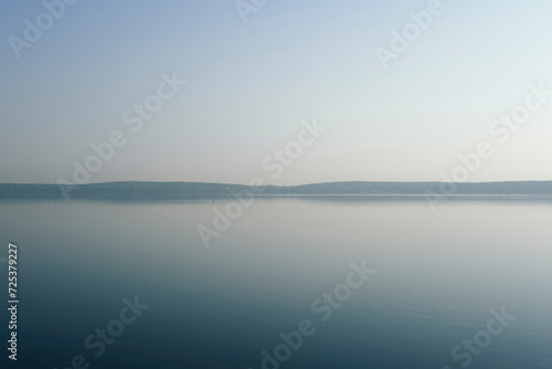 morning fog over the lake  horizon line