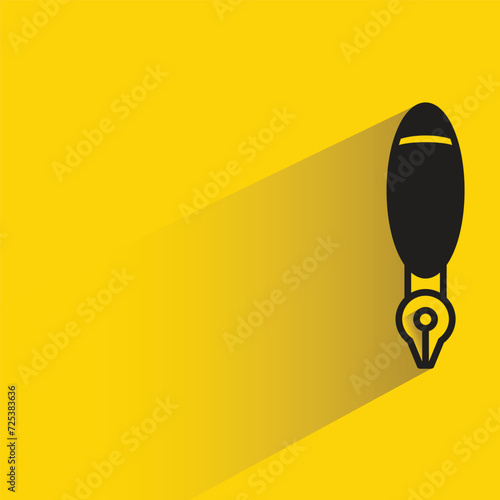 fountain pen icon with shadow on yellow background
