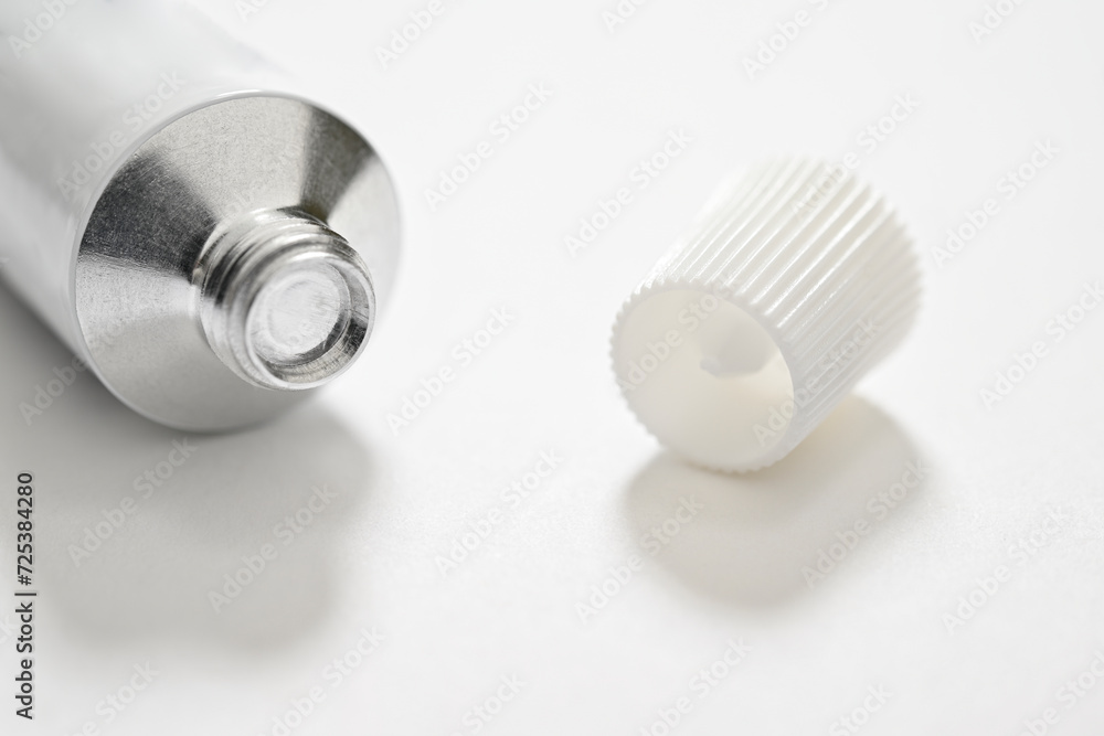 Lifehacks; The plastic cap of each tube has a spike in it used to break the foil/seal in the neck of the tube.
Lifehacks; The plastic cap of each tube has a spike in it used to break the foil/seal in the neck of the tube.