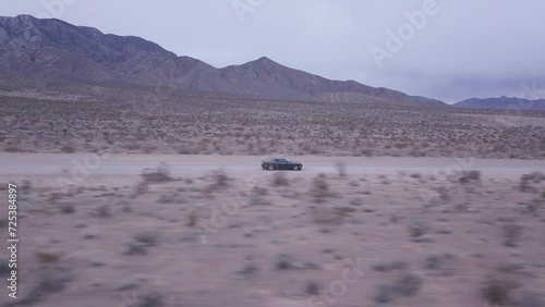 Drone footage following Dodge Challenger near Red Rock Canyon, United State