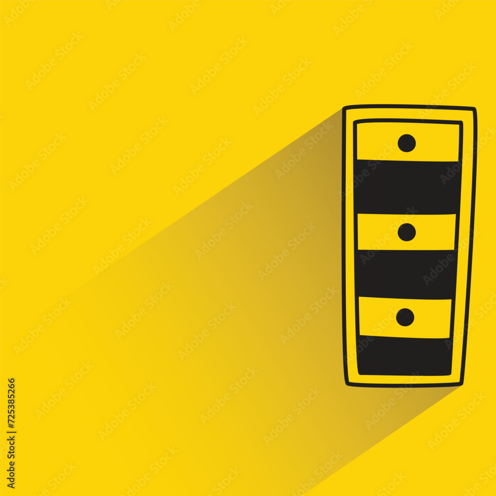 cupboard with shadow on yellow background cupboard with shadow on yellow background