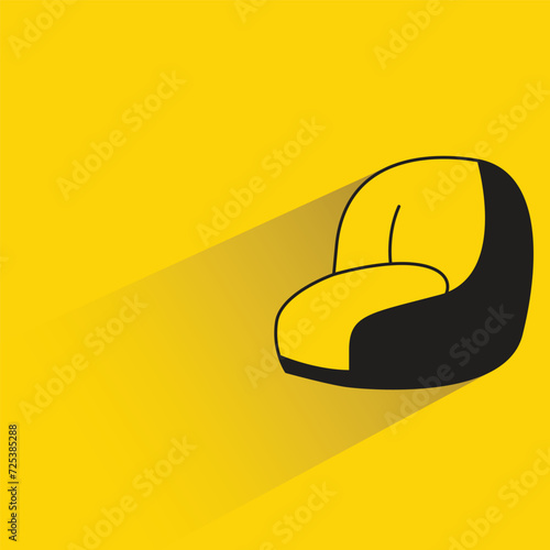 sofa with shadow on yellow background