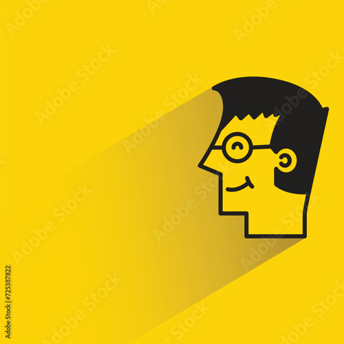 male face avatar with shadow on yellow background