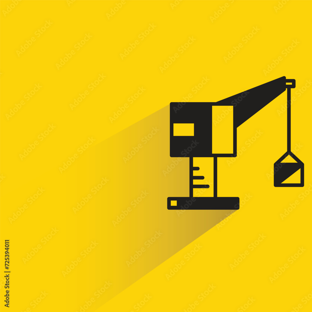 construction crane icon with shadow on yellow background construction crane icon with shadow on yellow background