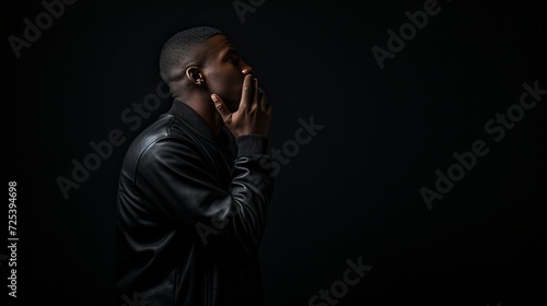 a man thinking, on a table, black and white background