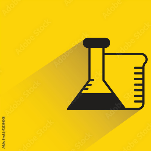 beaker and flask icon with shadow on yellow background