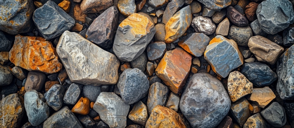 Dry round reeble stones creating a rocky, stony texture on an abstract background. Dry round reeble stones creating a rocky, stony texture on an abstract background.