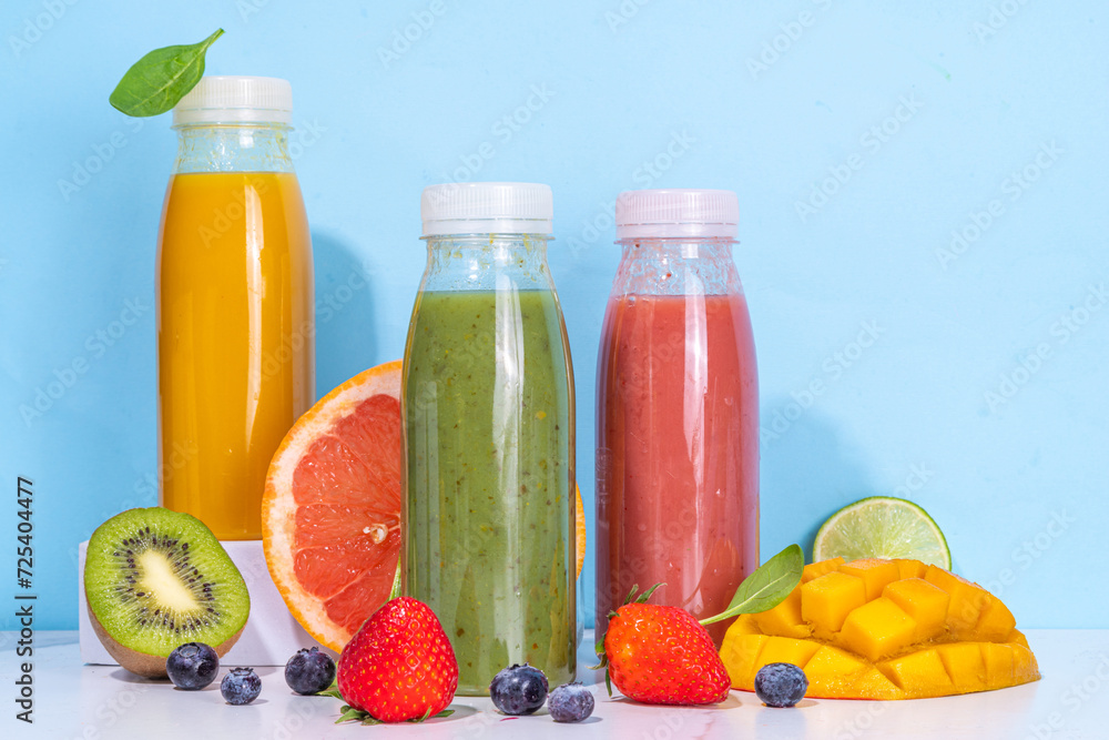 Colorful smoothies in glass bottles Colorful smoothies in glass bottles