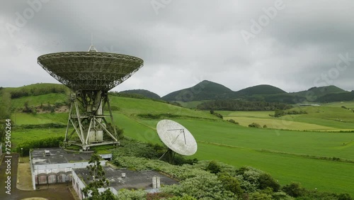 Drone fly over parabolic antenna radio station on cloudy day in Sao Miguel Island, Azores photo