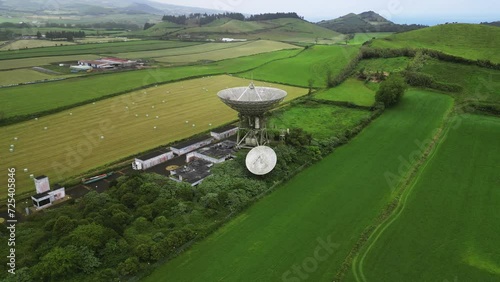 Drone fly over parabolic antenna radio station on cloudy day in Sao Miguel Island, Azores photo