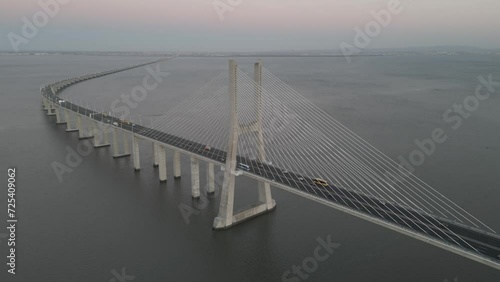 Drone flyover shot of Vasco da Gama bridge in Lisbon Portugal photo