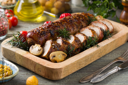 Cuadro en lienzo Pork tenderloin, served with mushrooms and peppers.