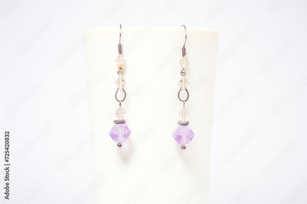 lavender amethyst beads forming dangling earrings lavender amethyst beads forming dangling earrings
