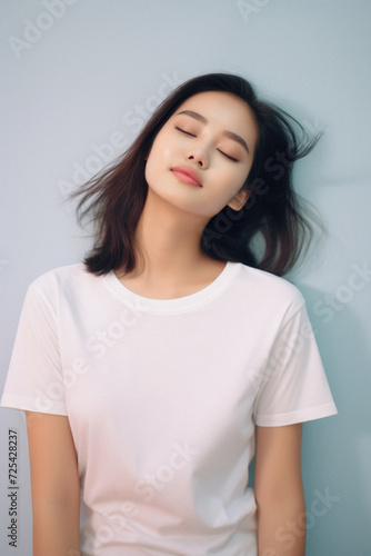 Young adult healthy beautiful Asian woman model wearing white t-shirt on background. Face flawless perfect fresh skin care korean cosmetic treatment makeup products skincare ads. Beauty portrait .