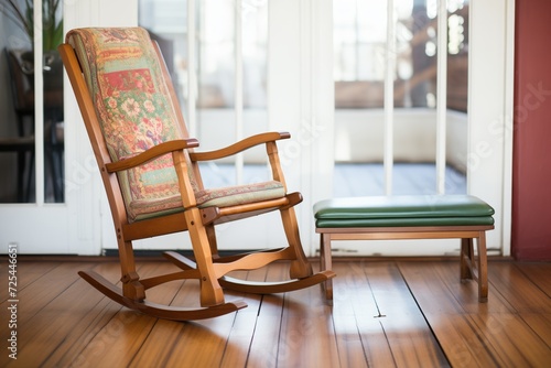 wooden footrest next to a traditional rocking chair
