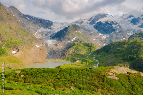 Aerial view of Steingletscher, alpine lake and mountain landscape, Switzerland photo