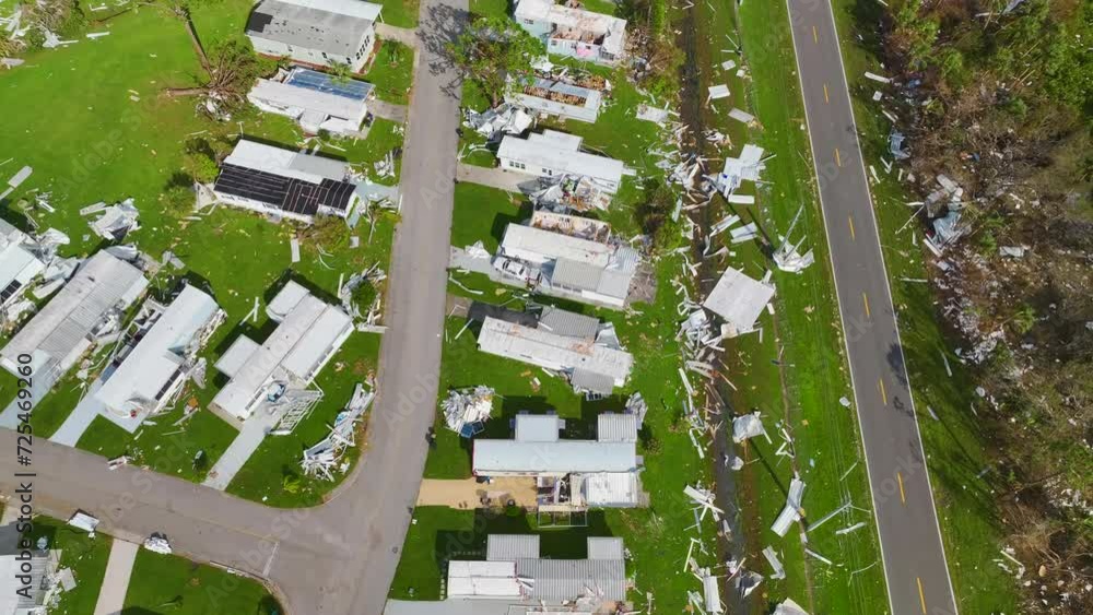Severely damaged by hurricane Ian houses in Florida mobile home residential area. Consequences of natural disaster Severely damaged by hurricane Ian houses in Florida mobile home residential area. Consequences of natural disaster