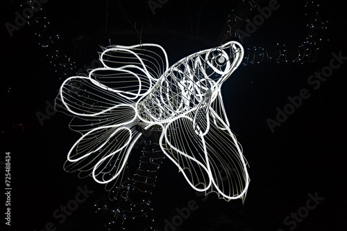 Big luminous white fish silhouette outdoor decoration