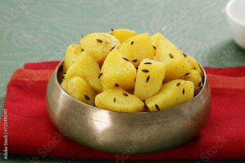 Jeera Aloo Or Fried Jeera Aloo Or Cumin Patatoes photo