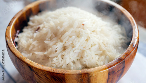 Steaming Wooden Bowl of Rice photo