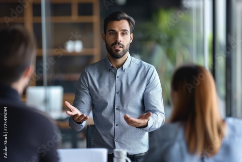 A manager addressing workplace challenges, showcasing problem-solving and conflict resolution skills in a professional setting