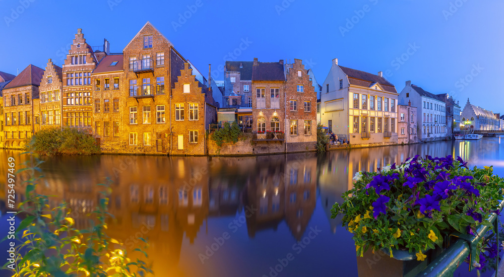 Medieval houses on quay of Leie river at night, Old Town of Ghent, Belgium