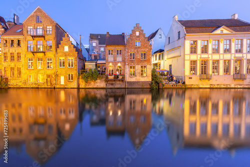 Medieval houses on quay of Leie river at night, Old Town of Ghent, Belgium