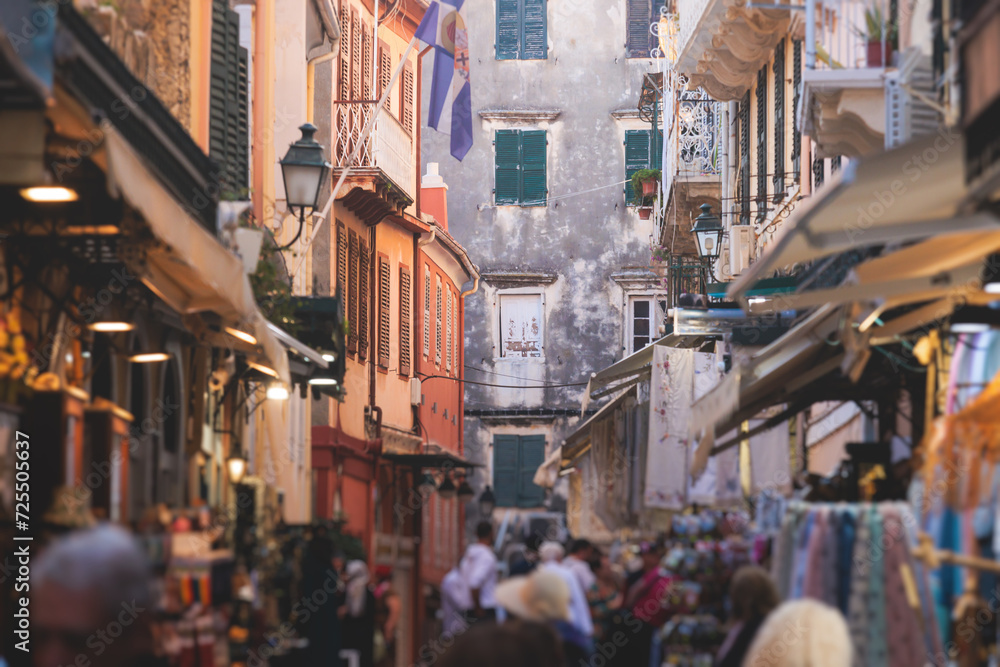 Corfu street view, Kerkyra old town beautiful cityscape, Ionian sea Islands, Greece, a summer sunny day, pedestrian streets with shops and cafes, architecture of historic center, travel to Greece - obrazy, fototapety, plakaty 