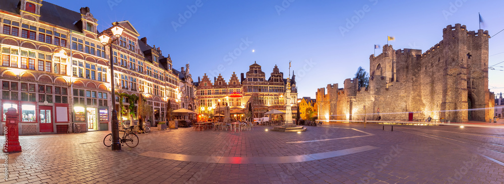 Obraz premium Panoramic view of Sint-Veerleplein, St Veerle Square, and Gravensteen at night, Ghent, Belgium