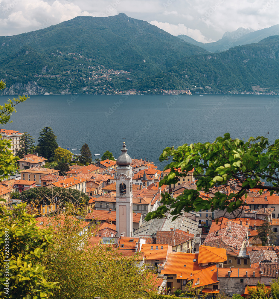 Menaggio skyline with the tower of St. Stephen's church in he province of Como, Lombardy, northern Italy, located on the western shore of Lake Como at the mouth of the river Senagra.