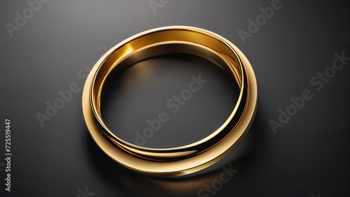 a gold ring on a black surface with a reflection of the ring on it's surface, with a black background