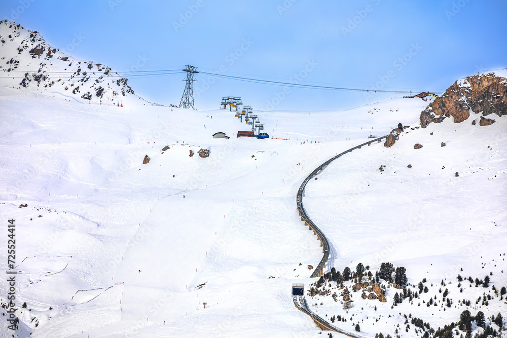 Town of Sankt Moritz luxury winter ski slope and cogwheel track view